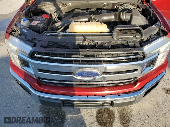 2019 Ford F-150 XL with VIN 1FTEW1E48KFA78516, listed as a Copart auction lot 65382775 with 70,810 mi miles and Salvage title. Bid and sale history available at DreamBid. Image 11.