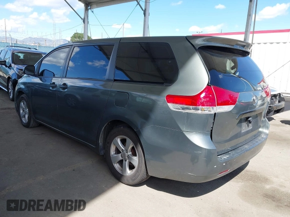 2014 Toyota Sienna L with VIN 5TDZK3DC6ES441417, listed as a IAAI auction lot 41950033 with 170,804 mi miles. Bid and sale history available at carsss.com. Image 3.