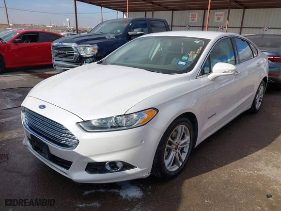 2015 Ford Fusion Titanium Hybrid with VIN 3FA6P0RU9FR308973, listed as a IAAI auction lot 41754320 with 82,686 mi miles. Bid and sale history available at carsss.com. Image 2.