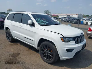 2020 Jeep Grand Cherokee Laredo E with VIN 1C4RJFAG5LC375033, listed as a IAAI auction lot 42415231 with 62,489 mi miles and . Bid and sale history available at DreamBid. Image 1.
