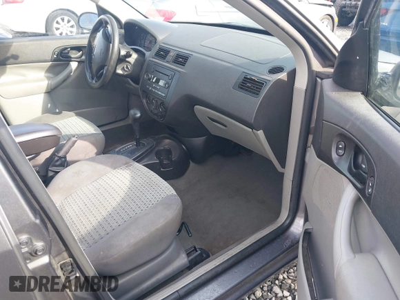 2006 Ford Focus S z VIN 1FAFP34NX6W179320, wystawiony jako IAAI lot #41937794 z przebiegiem 211 961 mil mil oraz . Historia ofert i sprzedaży dostępna na DreamBid. Obrazek 5.