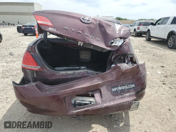 2006 Toyota Avalon XL z VIN 4T1BK36B46U104789, wystawiony jako Copart lot #56001885 z przebiegiem 427 702 mil mil oraz Szkoda całkowita • Salvage title. Historia ofert i sprzedaży dostępna na DreamBid. Obrazek 6.