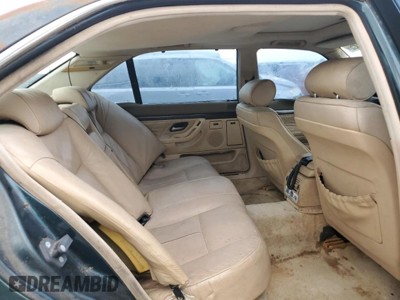 1996 BMW 7 Series 740iL z VIN WBAGJ8326TDL35670, wystawiony jako Copart lot #60806225 z przebiegiem 123 458 mil mil oraz Czysty tytuł • Clean title. Historia ofert i sprzedaży dostępna na DreamBid. Obrazek 10.