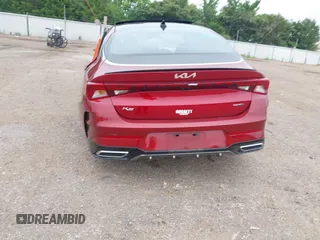 2022 Kia K5 GT-Line z VIN 5XXG64J29NG121197, wystawiony jako IAAI lot #39659829 z przebiegiem 49 590 mil mil oraz . Historia ofert i sprzedaży dostępna na DreamBid. Obrazek 16.