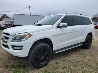 2015 Mercedes-Benz GL-Class GL 450 with VIN 4JGDF6EE2FA517080, listed as a IAAI auction lot 41640032 with 136,625 mi miles. Bid and sale history available at carsss.com. Image 2.