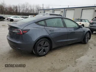 2021 Tesla Model 3 Standard Range Plus with VIN 5YJ3E1EA0MF907358, listed as a Copart auction lot 82103164 with 37,529 mi miles and Salvage Title. Bid and sale history available at DreamBid. Image 3.