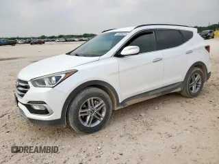 2018 Hyundai Santa Fe 2.4L with VIN 5NMZU3LB6JH106805, listed as a Copart auction lot 56906325 with 86,988 mi miles and Salvage title. Bid and sale history available at DreamBid. Image 1.