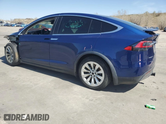 2017 Tesla Model X 90D with VIN 5YJXCDE23HF044790, listed as a Copart auction lot 52376565 with 105,712 mi miles and Salvage Title. Bid and sale history available at DreamBid. Image 2.