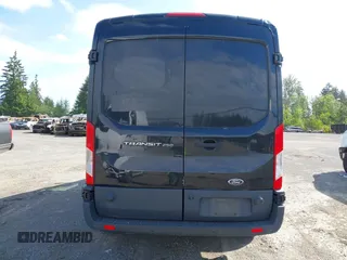 2015 Ford Transit Cargo z VIN 1FTYR2CMXFKB28360, wystawiony jako IAAI lot #42312402 z przebiegiem 126 228 mil mil oraz . Historia ofert i sprzedaży dostępna na DreamBid. Obrazek 16.