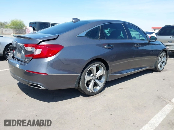 2019 Honda Accord Touring with VIN 1HGCV2F92KA004825, listed as a IAAI auction lot 41974555 with 74,464 mi miles and . Bid and sale history available at DreamBid. Image 4.