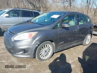 2013 Ford C-Max SE with VIN 1FADP5AU6DL544072, listed as a IAAI auction lot 41798270 with 203,489 mi miles and . Bid and sale history available at DreamBid. Image 2.