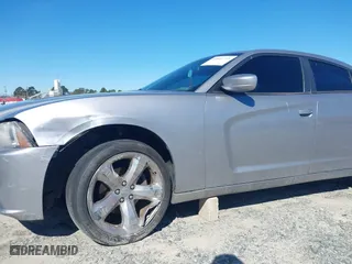 2014 Dodge Charger SXT with VIN 2C3CDXHG6EH166994, listed as a IAAI auction lot 41801739 with 163,314 mi miles. Bid and sale history available at carsss.com. Image 6.