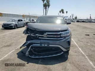 2023 Volkswagen Atlas SE z VIN 1V2JE2CAXPC216712, wystawiony jako Copart lot #58608325 z przebiegiem 22 649 mil mil oraz Szkoda całkowita • Salvage title. Historia ofert i sprzedaży dostępna na DreamBid. Obrazek 14.