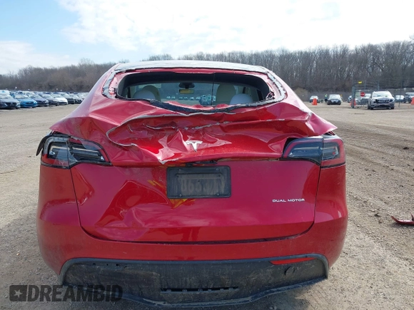 2023 Tesla Model Y Long Range with VIN 7SAYGDEE6PA157652, listed as a IAAI auction lot 41866777 with 22,584 mi miles. Bid and sale history available at carsss.com. Image 16.