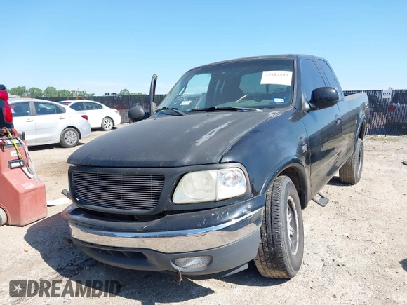 1999 Ford F-150 XL with VIN 1FTRX18L3XKA77743, listed as a IAAI auction lot 42512532 with Not provided miles and . Bid and sale history available at DreamBid. Image 18.