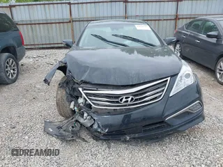 2016 Hyundai Azera Limited with VIN KMHFH4JG8GA547071, listed as a IAAI auction lot 42231526 with 175,537 mi miles and . Bid and sale history available at DreamBid. Image 13.