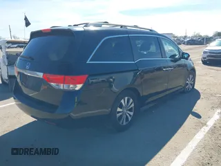 2015 Honda Odyssey EX-L with VIN 5FNRL5H68FB079528, listed as a IAAI auction lot 41893783 with 90,371 mi miles and . Bid and sale history available at DreamBid. Image 4.
