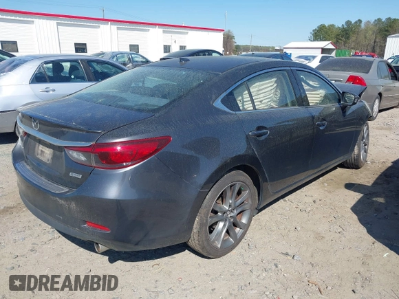 2016 Mazda Mazda6 i Grand Touring with VIN JM1GJ1W56G1432116, listed as a IAAI auction lot 41888066 with 124,182 mi miles. Bid and sale history available at carsss.com. Image 4.