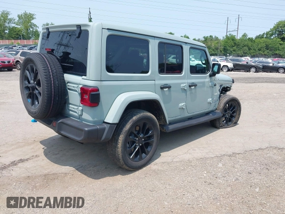 2023 Jeep Wrangler Sahara with VIN 1C4JJXP6XPW554741, listed as a IAAI auction lot 42380681 with 15,148 mi miles and . Bid and sale history available at DreamBid. Image 4.