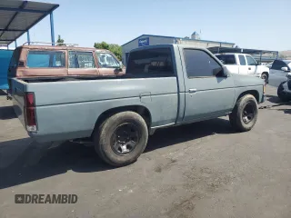 1990 Nissan Frontier with VIN 1N6SD11S9LC321876, listed as a Copart auction lot 59913575 with 119,909 mi miles and Salvage title. Bid and sale history available at DreamBid. Image 3.