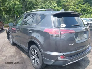 2018 Toyota RAV4 XLE with VIN JTMWFREV7JD111785, listed as a IAAI auction lot 42583535 with 110,724 mi miles and . Bid and sale history available at DreamBid. Image 3.