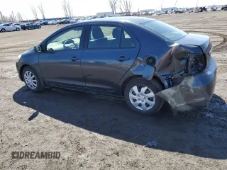 2012 Toyota Yaris with VIN JTDBT4K36CL028550, listed as a Copart auction lot 52071475 with 173,922 mi miles and Salvage Title. Bid and sale history available at DreamBid. Image 2.