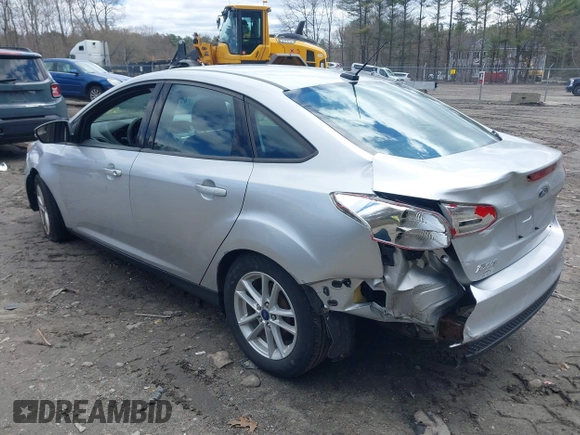 2017 Ford Focus SE with VIN 1FADP3F25HL335102, listed as a IAAI auction lot 42010697 with 77,389 mi miles. Bid and sale history available at carsss.com. Image 3.