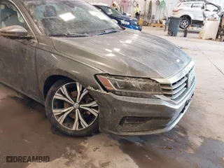2021 Volkswagen Passat 2.0T SE with VIN 1VWSA7A30MC000721, listed as a IAAI auction lot 41614367 with 98,621 mi miles. Bid and sale history available at carsss.com. Image 6.