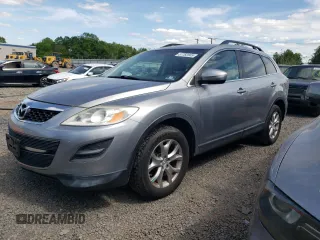2011 Mazda CX-9 Touring z VIN JM3TB3CV3B0323789, wystawiony jako Copart lot #57762505 z przebiegiem 151 942 mil mil oraz Czysty tytuł • Clean title. Historia ofert i sprzedaży dostępna na DreamBid. Obrazek 1.