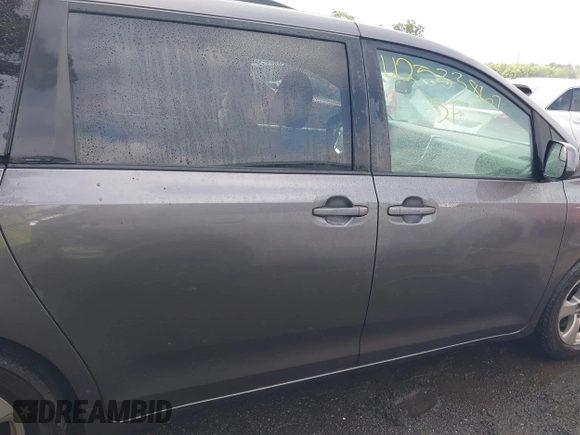 2015 Toyota Sienna LE AAS with VIN 5TDKK3DC8FS632906, listed as a IAAI auction lot 42533867 with 128,980 mi miles and . Bid and sale history available at DreamBid. Image 13.