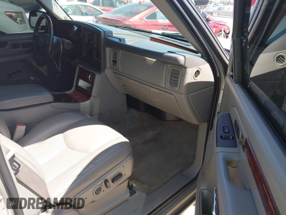 2005 Cadillac Escalade z VIN 1GYEC63N65R249827, wystawiony jako IAAI lot #42247650 z przebiegiem 254 052 mil mil oraz . Historia ofert i sprzedaży dostępna na DreamBid. Obrazek 5.