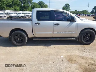 2012 Nissan Titan SV with VIN 1N6BA0ED8CN320723, listed as a IAAI auction lot 42642482 with 214,941 mi miles and . Bid and sale history available at DreamBid. Image 13.