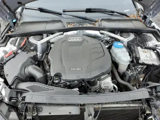 2017 Audi A4 Premium z VIN WAUANAF46HN027236, wystawiony jako Copart lot #60141515 z przebiegiem 103 700 mil mil oraz Szkoda całkowita • Salvage title. Historia ofert i sprzedaży dostępna na DreamBid. Obrazek 11.