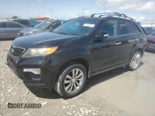2012 Kia Sorento SX z VIN 5XYKW4A28CG193611, wystawiony jako Copart lot #57659935 z przebiegiem 203 349 mil mil oraz Szkoda całkowita • Salvage title. Historia ofert i sprzedaży dostępna na DreamBid. Obrazek 1.