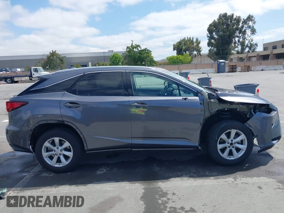 2017 Lexus RX 350 z VIN 2T2ZZMCA7HC035348, wystawiony jako IAAI lot #42357182 z przebiegiem 88 934 mil mil oraz . Historia ofert i sprzedaży dostępna na DreamBid. Obrazek 14.