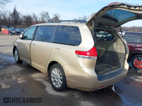 2014 Toyota Sienna Ltd with VIN 5TDDK3DC0ES091759, listed as a IAAI auction lot 41150493 with 155,165 mi miles. Bid and sale history available at carsss.com. Image 3.