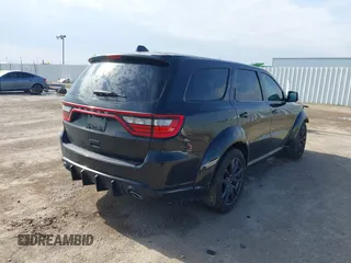 2019 Dodge Durango SRT with VIN 1C4SDJGJ2KC550562, listed as a IAAI auction lot 41549390 with 51,217 mi miles and . Bid and sale history available at DreamBid. Image 4.