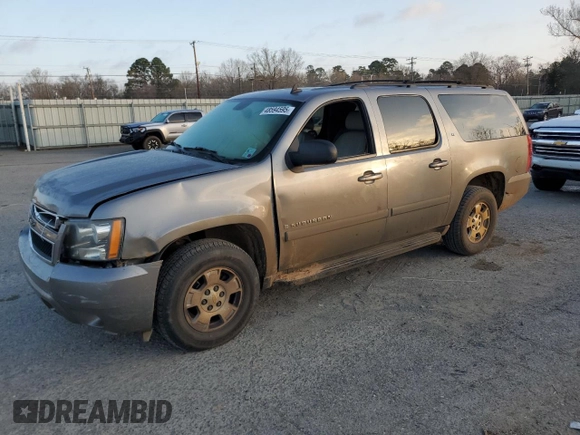 2007 Chevrolet Suburban LT z VIN 1GNFK163X7R411642, wystawiony jako Copart lot #48594595 z przebiegiem 233 733 mil mil oraz Szkoda całkowita • Salvage title. Historia ofert i sprzedaży dostępna na DreamBid. Obrazek 1.