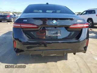 2024 BMW i5 M60 z VIN WBY43FK00RCP12947, wystawiony jako Copart lot #73754024 z przebiegiem Nie podano mil oraz Szkody całkowita. Historia ofert i sprzedaży dostępna na DreamBid. Obrazek 10.