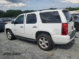 2011 Chevrolet Tahoe LS with VIN 1GNSCAE08BR394917, listed as a Copart auction lot 60470395 with 143,824 mi miles and Salvage title. Bid and sale history available at DreamBid. Image 2.