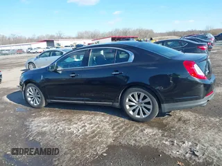 2014 Lincoln MKS with VIN 1LNHL9DKXEG606359, listed as a IAAI auction lot 41341206 with 286,687 mi miles and . Bid and sale history available at DreamBid. Image 14.
