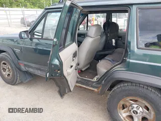 1993 Jeep Cherokee Sport with VIN 1J4FJ68S2PL622716, listed as a IAAI auction lot 42570145 with 183,159 mi miles and . Bid and sale history available at DreamBid. Image 8.