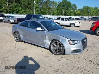 2016 Audi A5 Premium Plus with VIN WAUM2AFRXGA014318, listed as a IAAI auction lot 42318116 with 80,628 mi miles and . Bid and sale history available at DreamBid. Image 1.