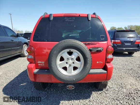 2002 Jeep Liberty Limited with VIN 1J8GL58K42W328443, listed as a Copart auction lot 52768345 with 218,459 mi miles and Salvage title. Bid and sale history available at DreamBid. Image 6.