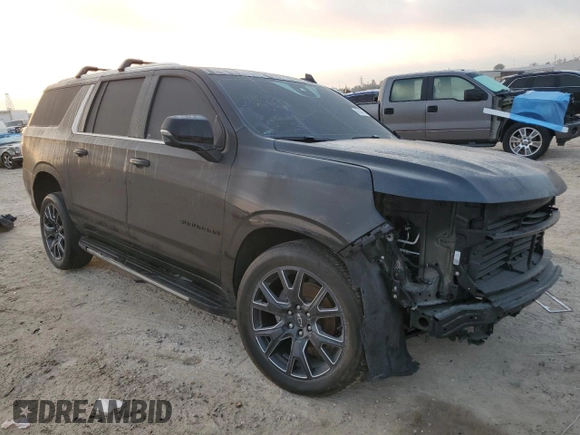 2023 Chevrolet Suburban LT with VIN 1GNSCCKD1PR555635, listed as a Copart auction lot 43834915 with 32,982 mi miles and Salvage Title. Bid and sale history available at DreamBid. Image 4.