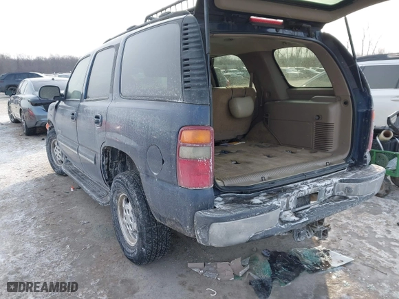 2003 Chevrolet Tahoe LT with VIN 1GNEC13Z63R182212, listed as a IAAI auction lot 41399286 with 241,980 mi miles. Bid and sale history available at carsss.com. Image 3.