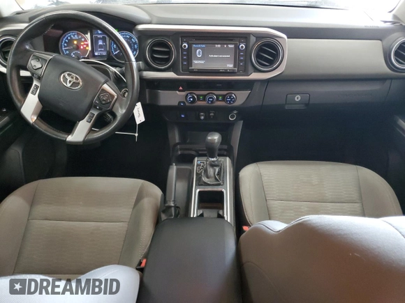 2018 Toyota Tacoma SR5 with VIN 3TMAZ5CN7JM074058, listed as a Copart auction lot 51586455 with 117,877 mi miles and Salvage Title. Bid and sale history available at DreamBid. Image 8.