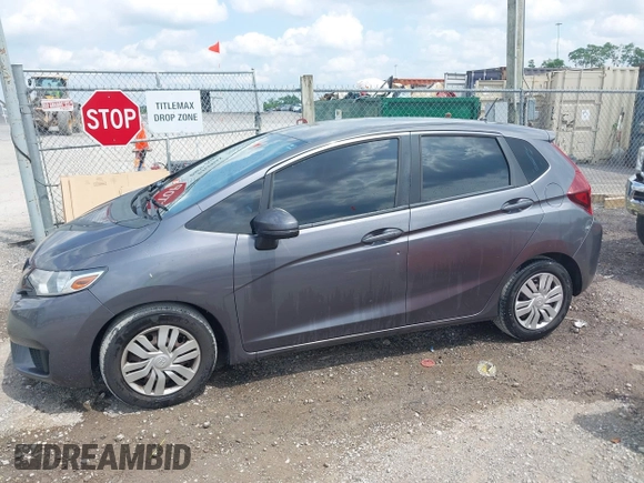2015 Honda Fit LX with VIN 3HGGK5H5XFM744332, listed as a IAAI auction lot 42149999 with 91,101 mi miles. Bid and sale history available at carsss.com. Image 14.