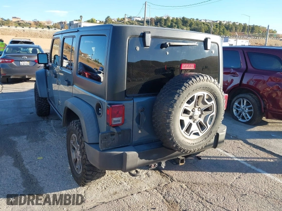2014 Jeep Wrangler Unlimited Rubicon X with VIN 1C4BJWFG3EL134522, listed as a IAAI auction lot 41221381 with 66,897 mi miles and . Bid and sale history available at DreamBid. Image 3.