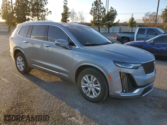 2024 Cadillac XT6 FWD Luxury with VIN 1GYKPAR40RZ744121, listed as a Copart auction lot 86413604 with 7,527 mi miles and Salvage Title. Bid and sale history available at carsss.com. Image 4.